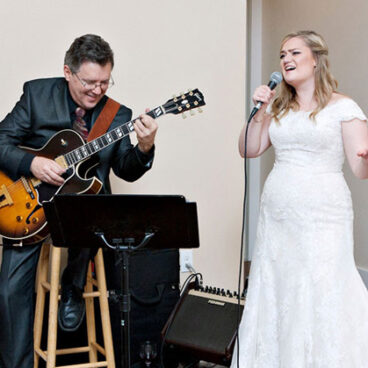 Accompanying the bride for a special song